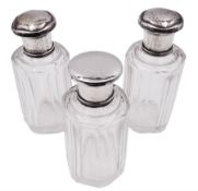 Set of three German silver mounted glass dressing table jars