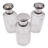 Set of three German silver mounted glass dressing table jars