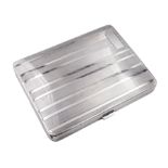 1920's silver cigarette case with engine turned horizontal striped decoration and vacant panel to to