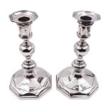 Pair of George V silver mounted candlesticks