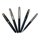 Four Parker fountain pens