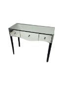 Mirrored dressing table fitted with three drawers