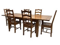 Late 20th century stained pine extending dining table with additional leaf