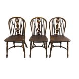 Late 20th century set three oak Windsor chairs