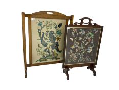 Mid-20th century oak fire screen with crewelwork panel with floral and animal designs (88cm x 69cm)