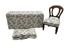 Ottoman blanket box upholstered in floral pattern fabric