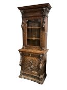 Victorian heavily carved oak cabinet