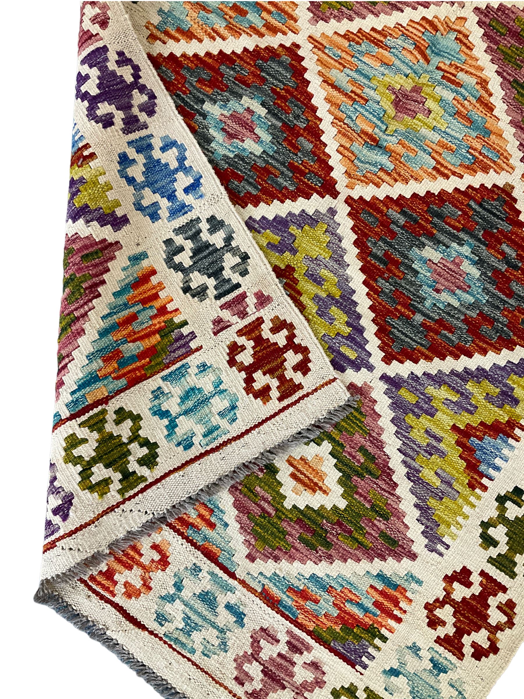 Chobi Kilim ivory and multi-colour rug decorated with stepped geometric lozenges and repeating borde - Image 3 of 3