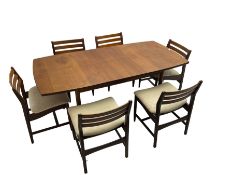 Mid 20th century teak extending dining table with additional leaf