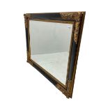 Gilt and ebonised framed wall mirror