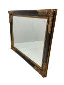 Gilt and ebonised framed wall mirror
