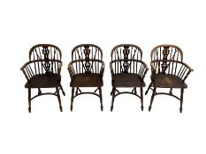 Late 20th century set four oak Windsor elbow chairs