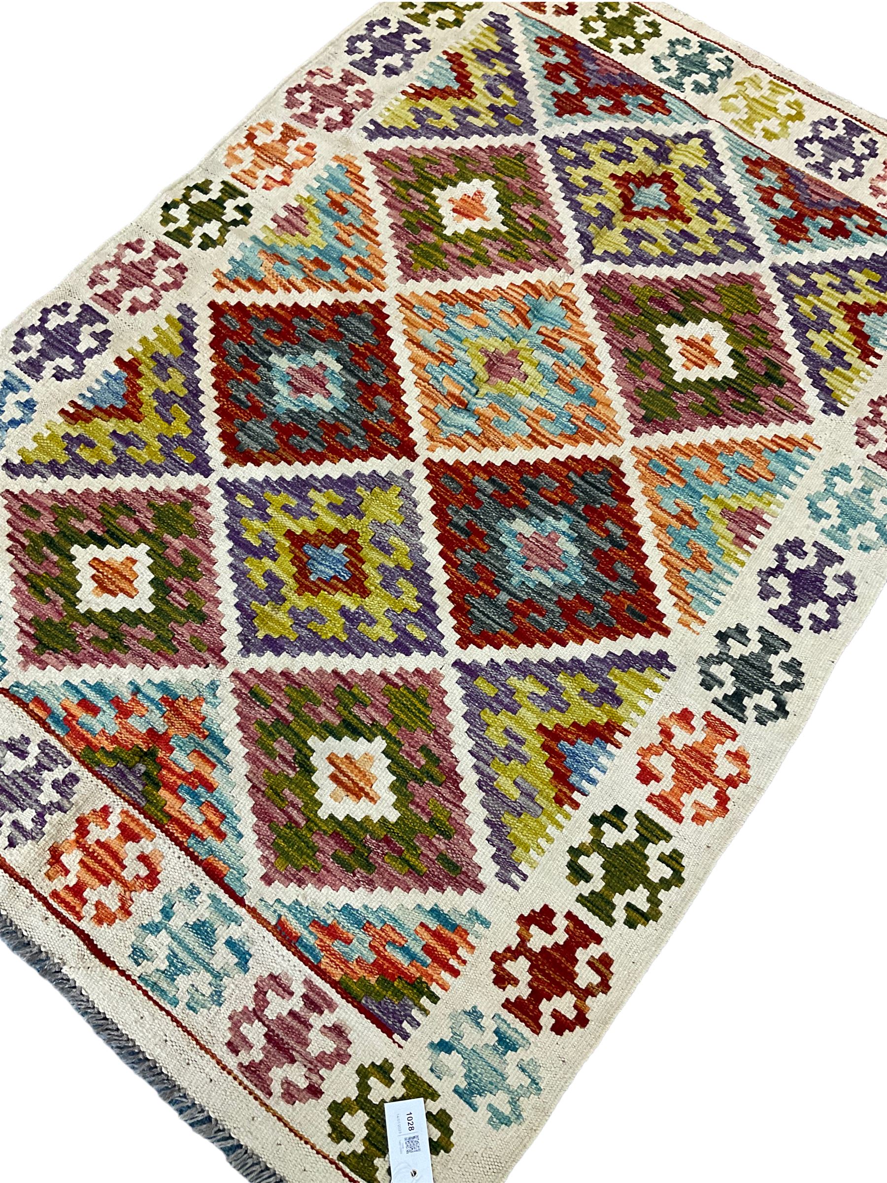 Chobi Kilim ivory and multi-colour rug decorated with stepped geometric lozenges and repeating borde - Image 2 of 3