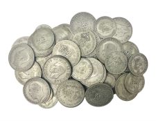 Approximately 370 grams of Great British pre-1947 shillings and florins