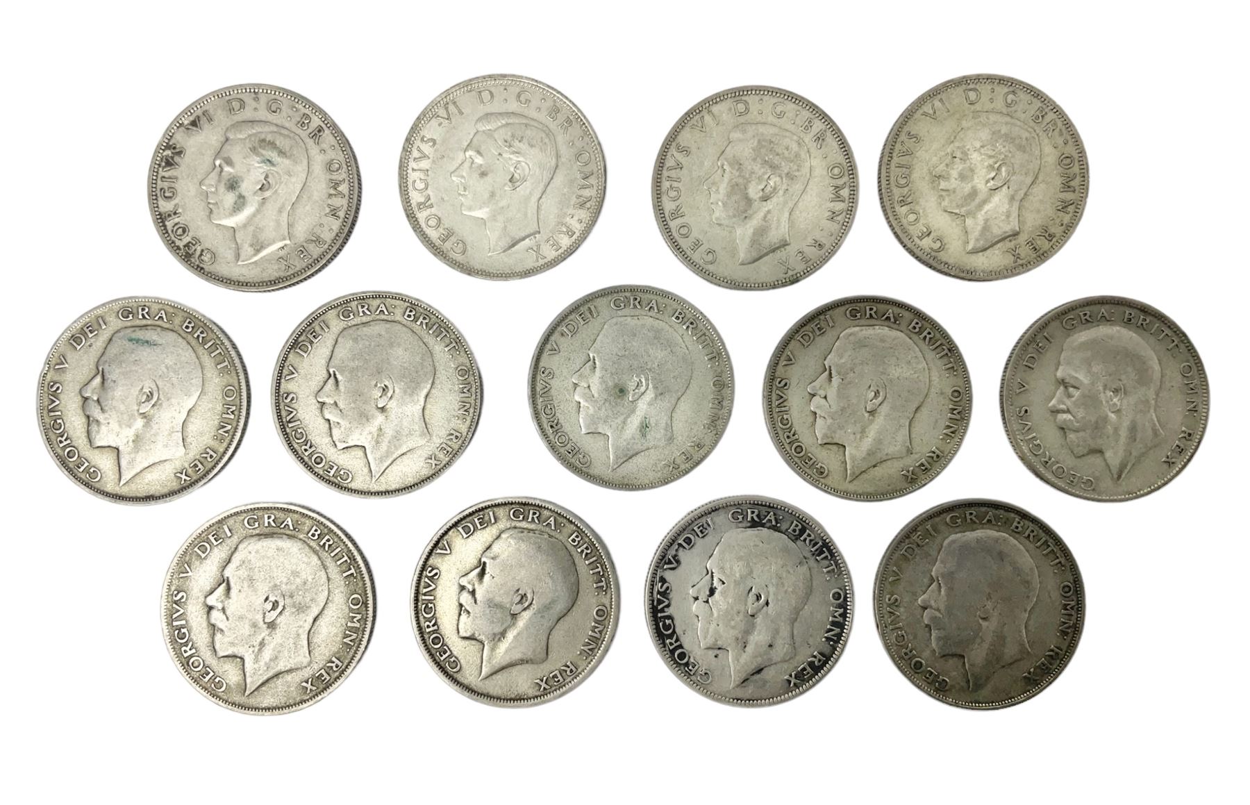 Approximately 180 grams of Great British pre-1947 silver halfcrown coins