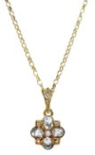 Gold oval aquamarine and diamond flower cluster pendant necklace