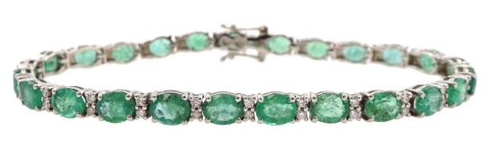 18ct white gold oval emerald and round brilliant cut diamond bracelet