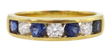 18ct gold channel set seven stone round brilliant cut diamond and round sapphire ring