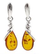 Pair of silver Baltic amber pear shaped pendant earrings