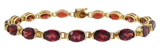 9ct gold oval garnet bracelet