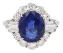 18ct white gold oval sapphire and tapered baguette diamond cluster ring