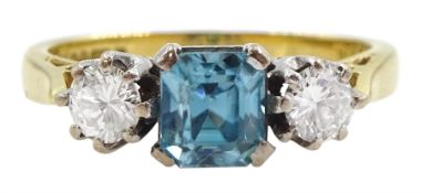 18ct gold three stone blue zircon and round brilliant cut diamond ring