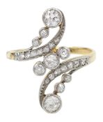 Art Nouveau gold and platinum milgrain set old cut diamond crossover twist ring