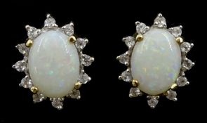 Pair of gold opal and cubic zirconia cluster stud earrings