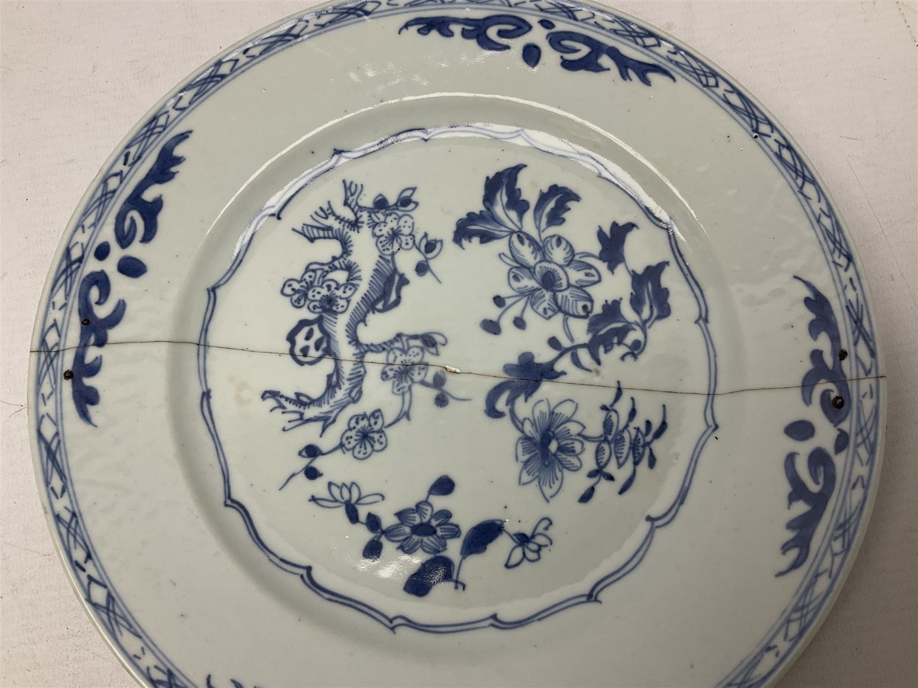 Set of four 18th century Chinese export blue and white porcelain plates with painted foliate decorat - Image 9 of 14