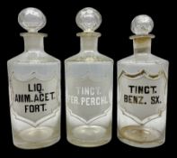 Three Victorian apothecary chemist bottles complete with labels and glass stoppers