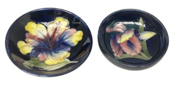 Moocroft small footed circular dish decorated in the Hibiscus pattern upon cobalt blue ground