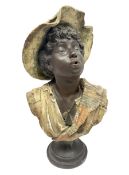 19th century plaster bust of a young boy wearing a hat