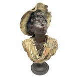 19th century plaster bust of a young boy wearing a hat