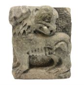 Carved stone relief in the form of a mythical creature