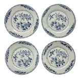 Set of four 18th century Chinese export blue and white porcelain plates with painted foliate decorat