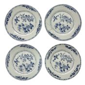 Set of four 18th century Chinese export blue and white porcelain plates with painted foliate decorat