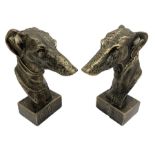 Pair of bronzed cast iron greyhound busts on plinths