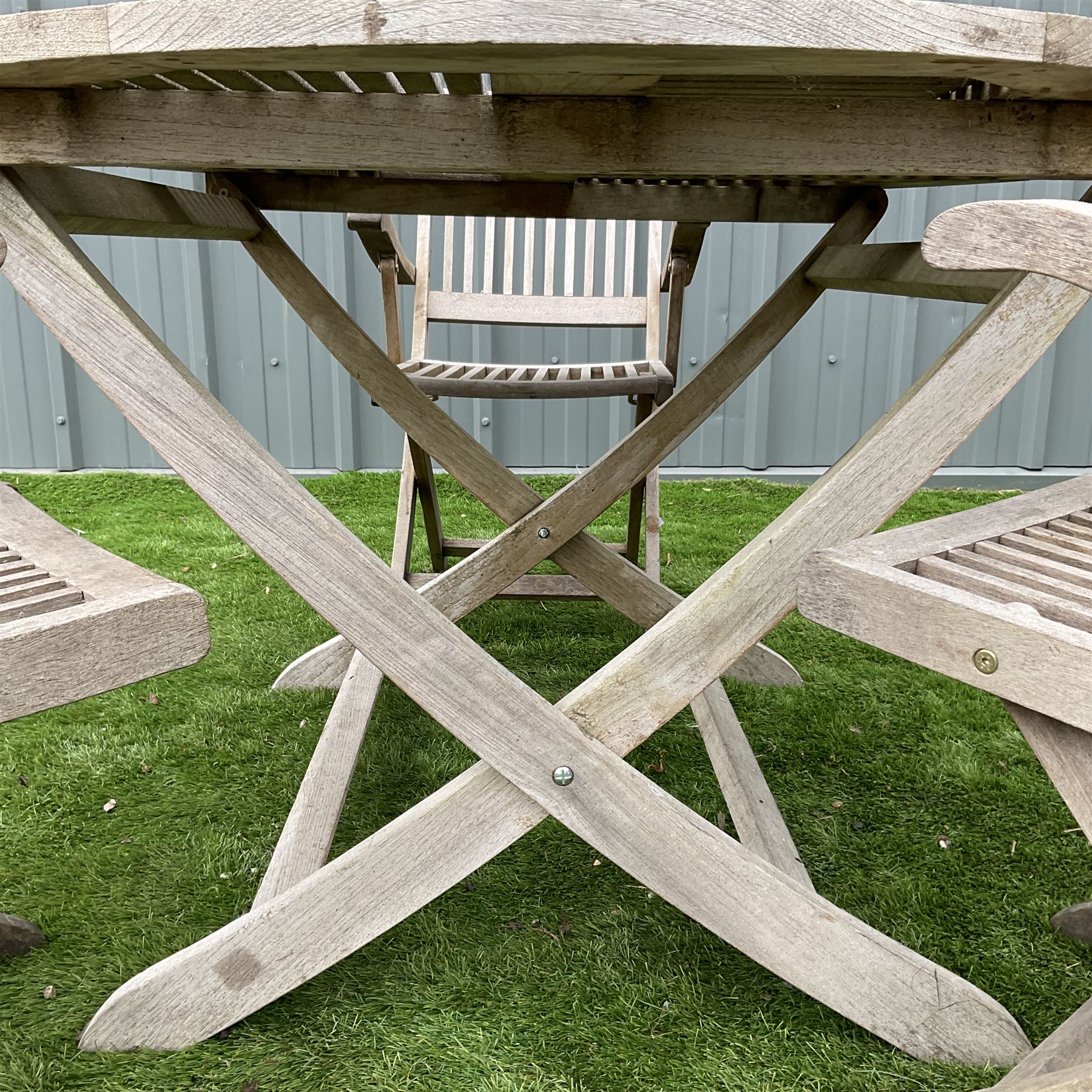 Cannock Gates teak circular garden table and three folding chairs - Image 3 of 4