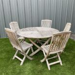 Teak circular garden folding table and five folding chairs