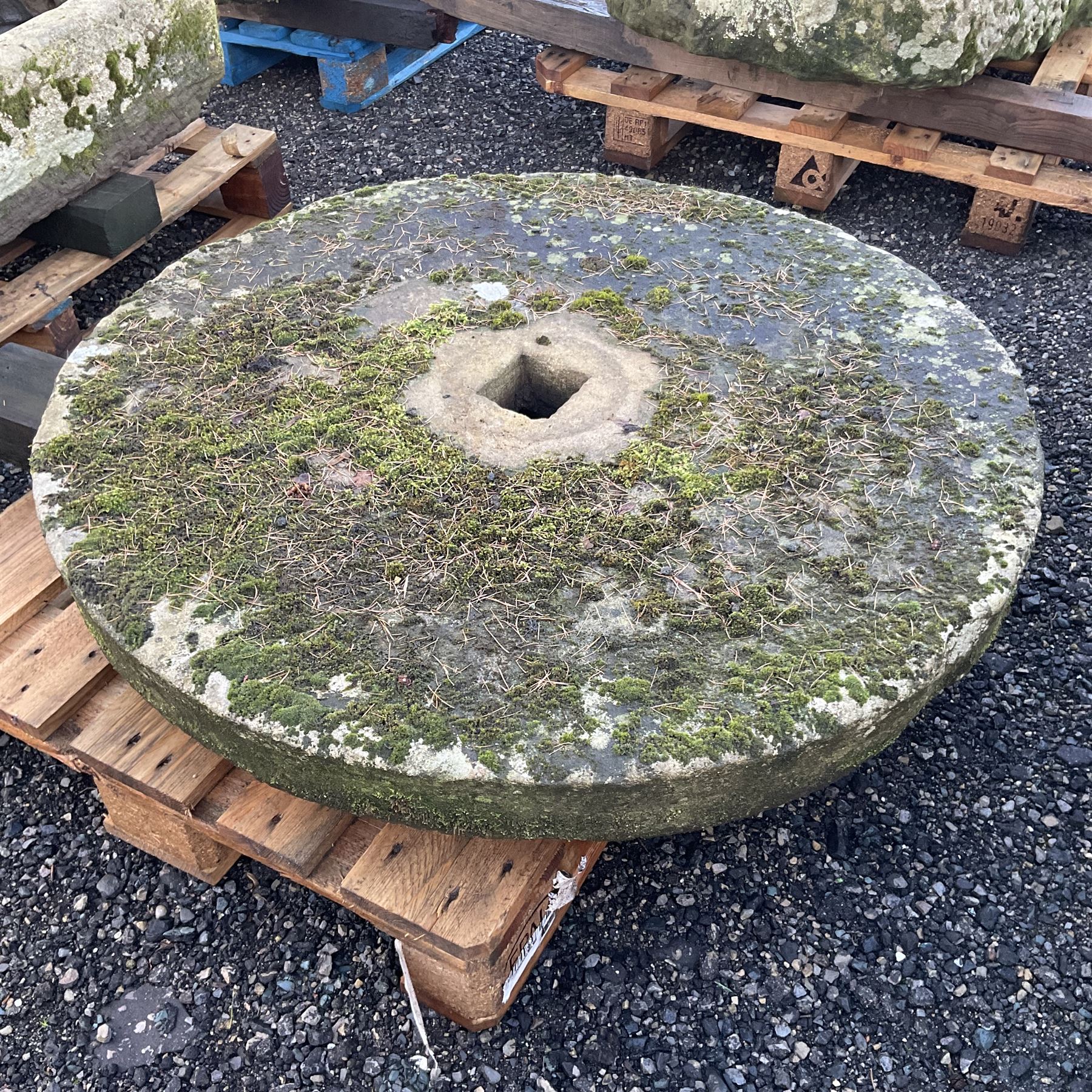 19th century circular grinding stone