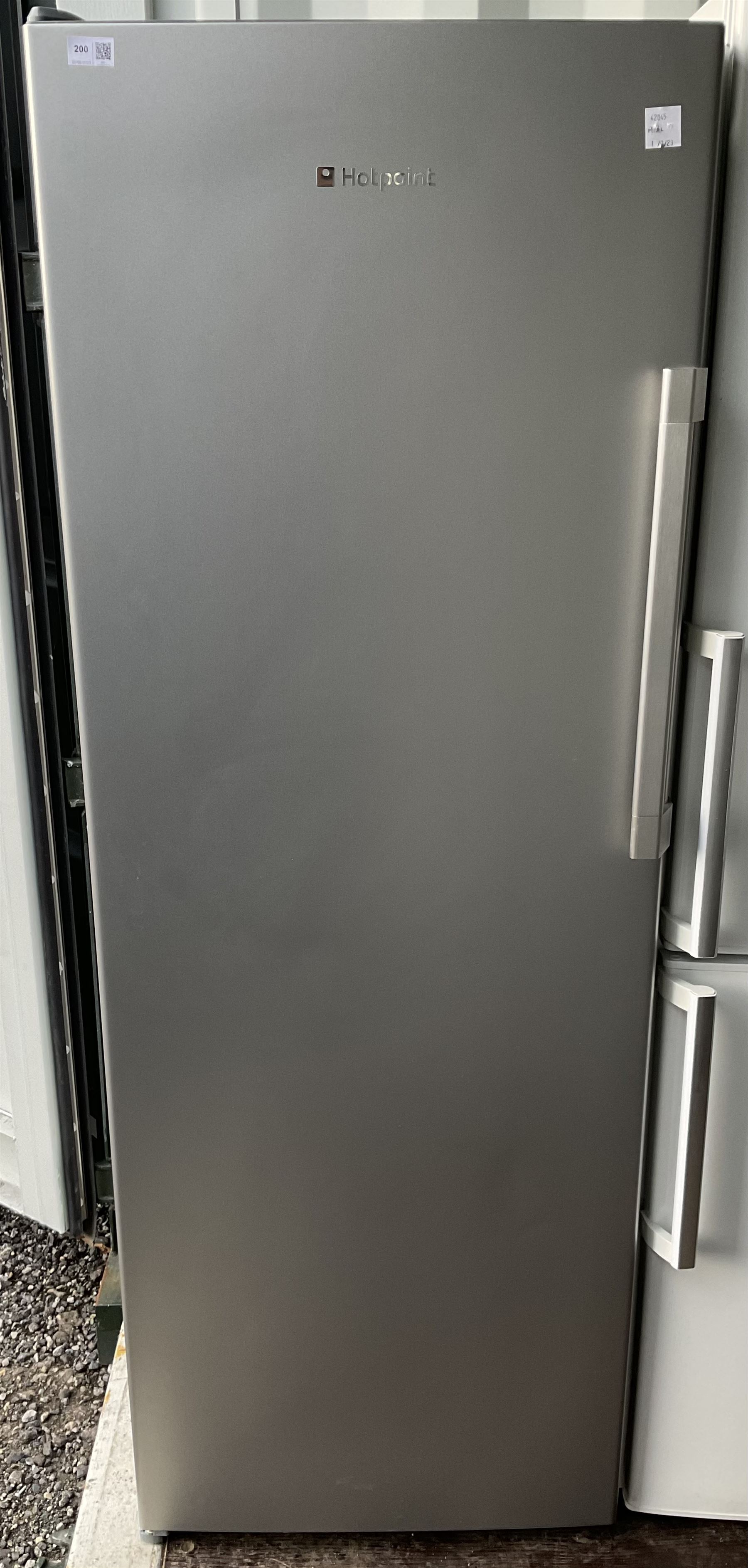 Hotpoint No Frost R600a upright freezer with six compartments.