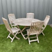 Teak circular garden folding table and five folding chairs