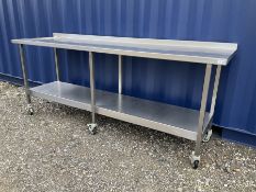 Large stainless steel preparation table on wheels