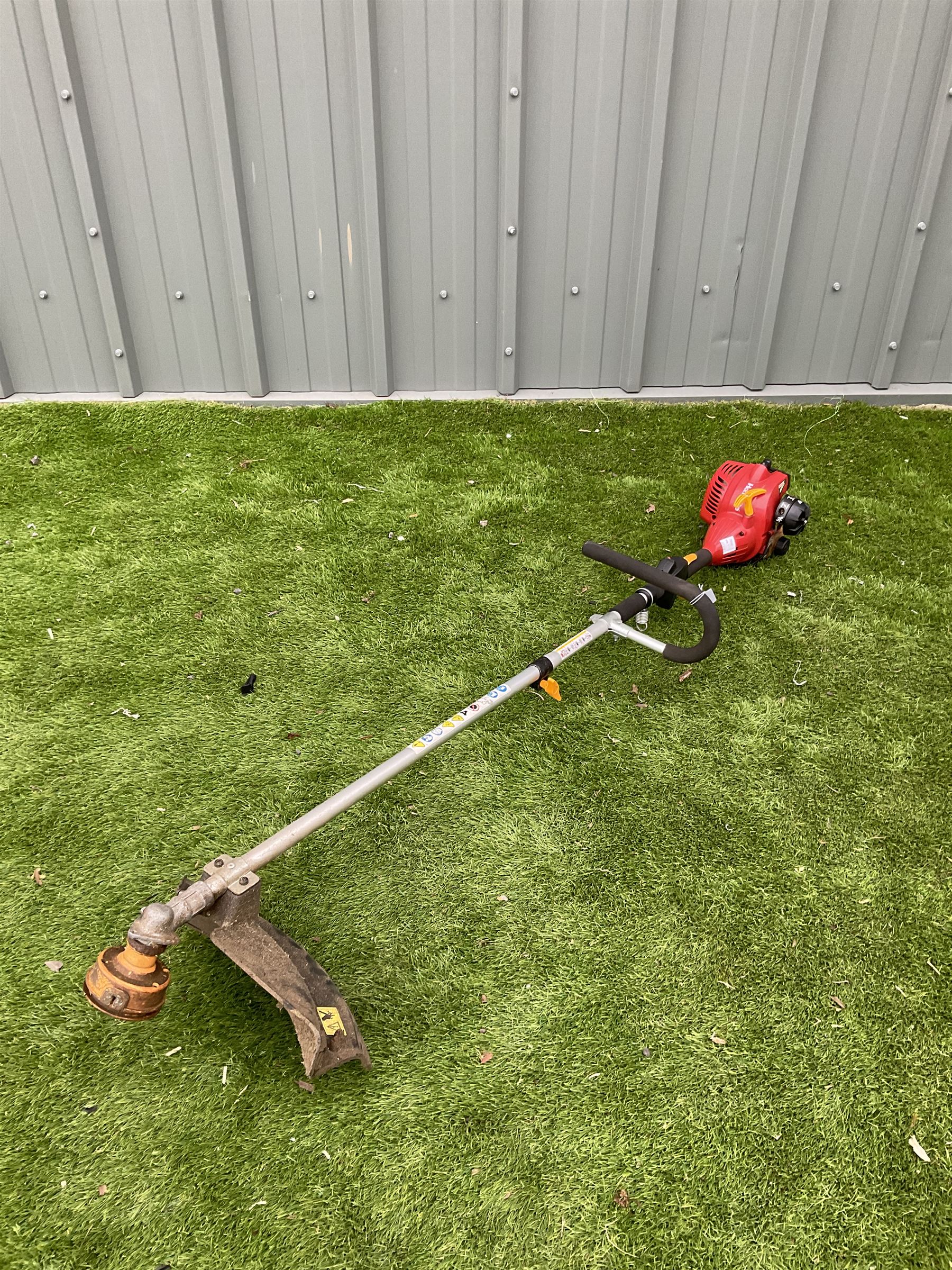 Homesite Mighty lite petrol strimmer