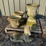 Cast stone animal with two garden urns decorated in grapes and faces with garden urn on plinth