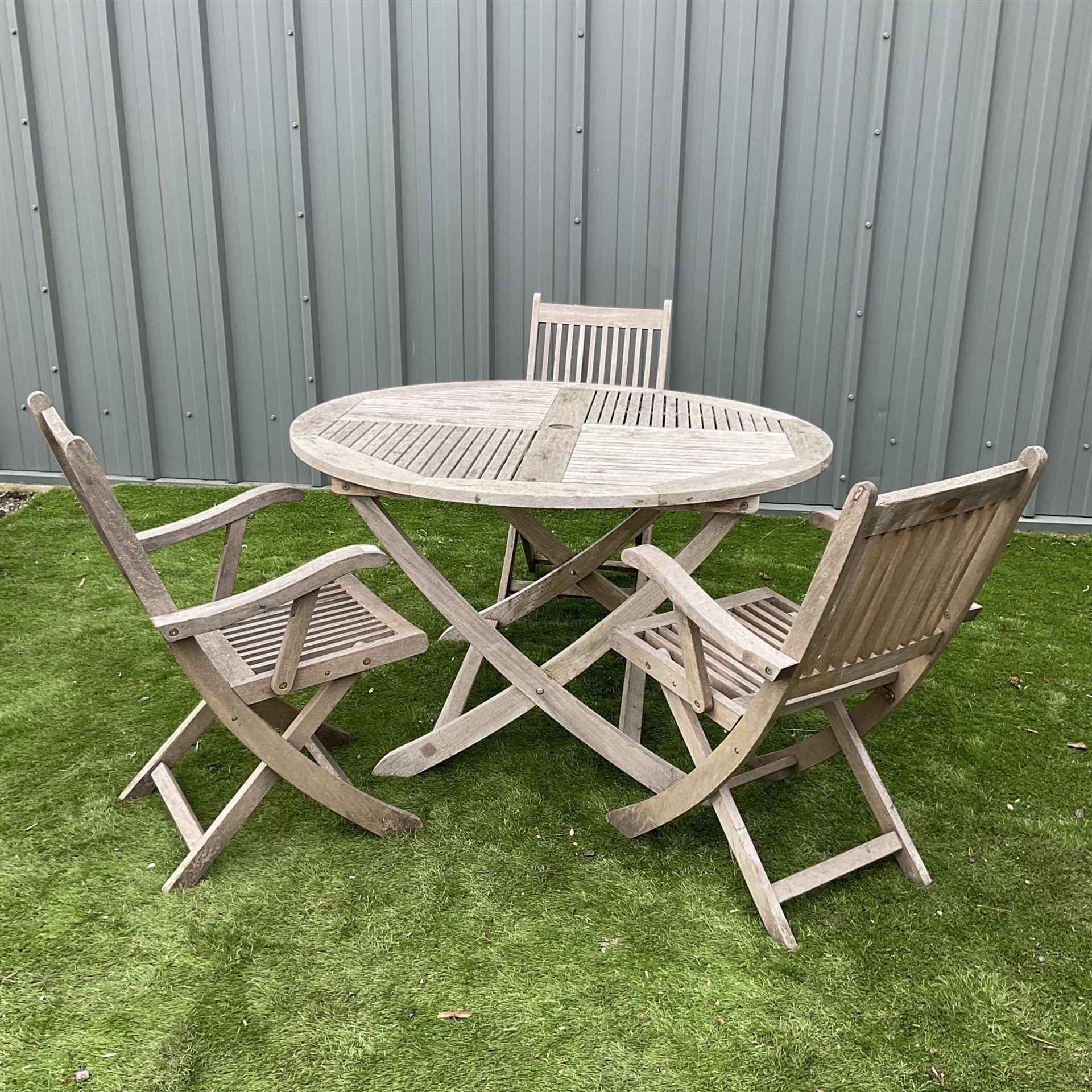 Cannock Gates teak circular garden table and three folding chairs