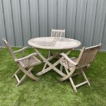 Cannock Gates teak circular garden table and three folding chairs