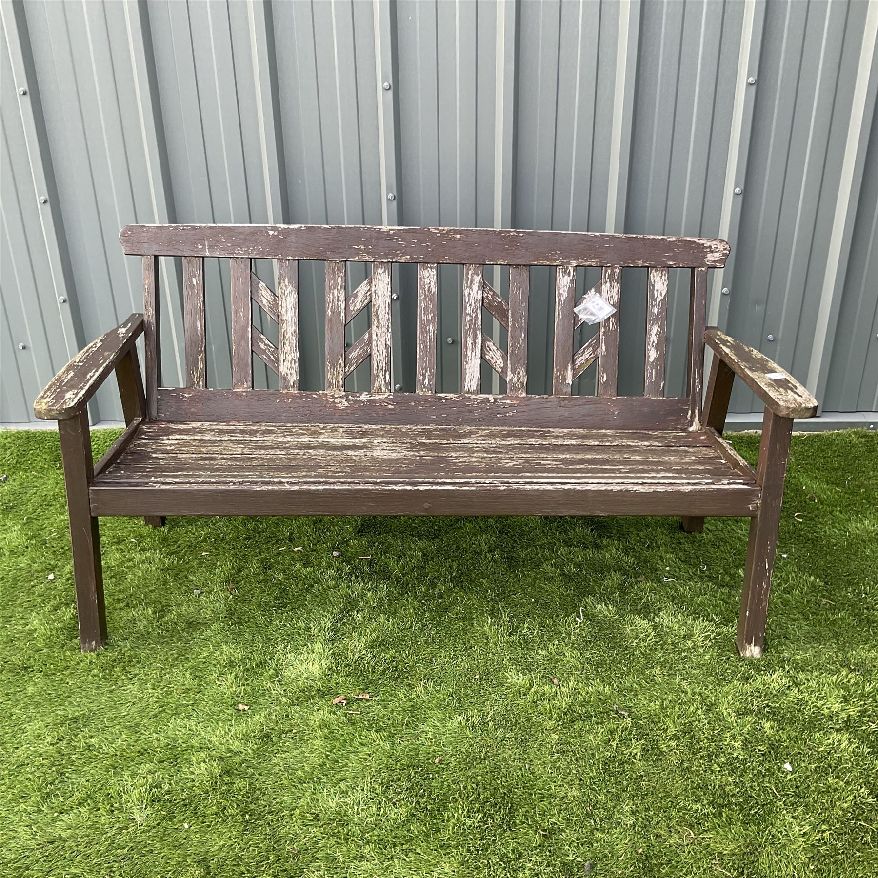 Brown painted plank bench