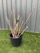 Plastic tub with gardening tools