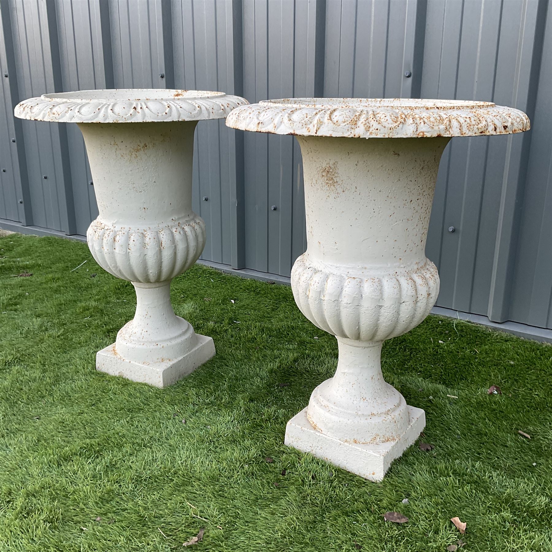 Pair of Victorian design cream painted cast iron garden urns